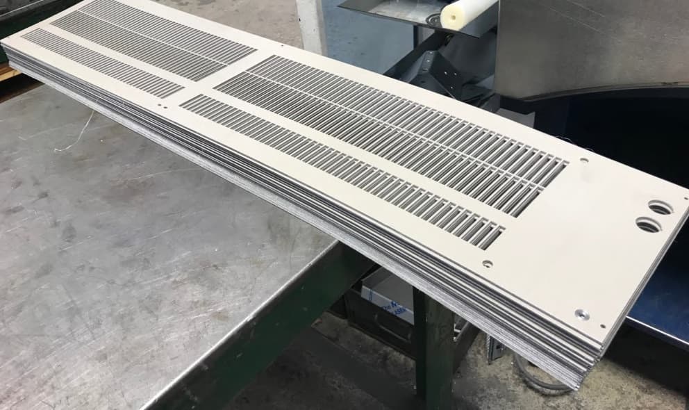 Slotted grille panels